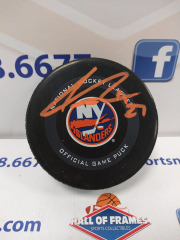 ANDERS LEE NEW YORK ISLANDERS SIGNED OFFICIAL GAME PUCK ORANGE INK BECKETT