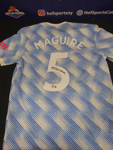 HARRY MAGUIRE SIGNED MANCHESTER UNITED ADIDAS MED JERSEY - BAS COA