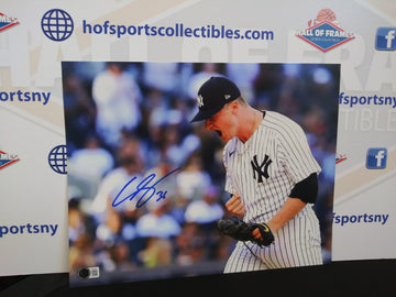 CLARKE SCHMIDT SIGNED YANKEES 11X14 PHOTO - BECKETT COA