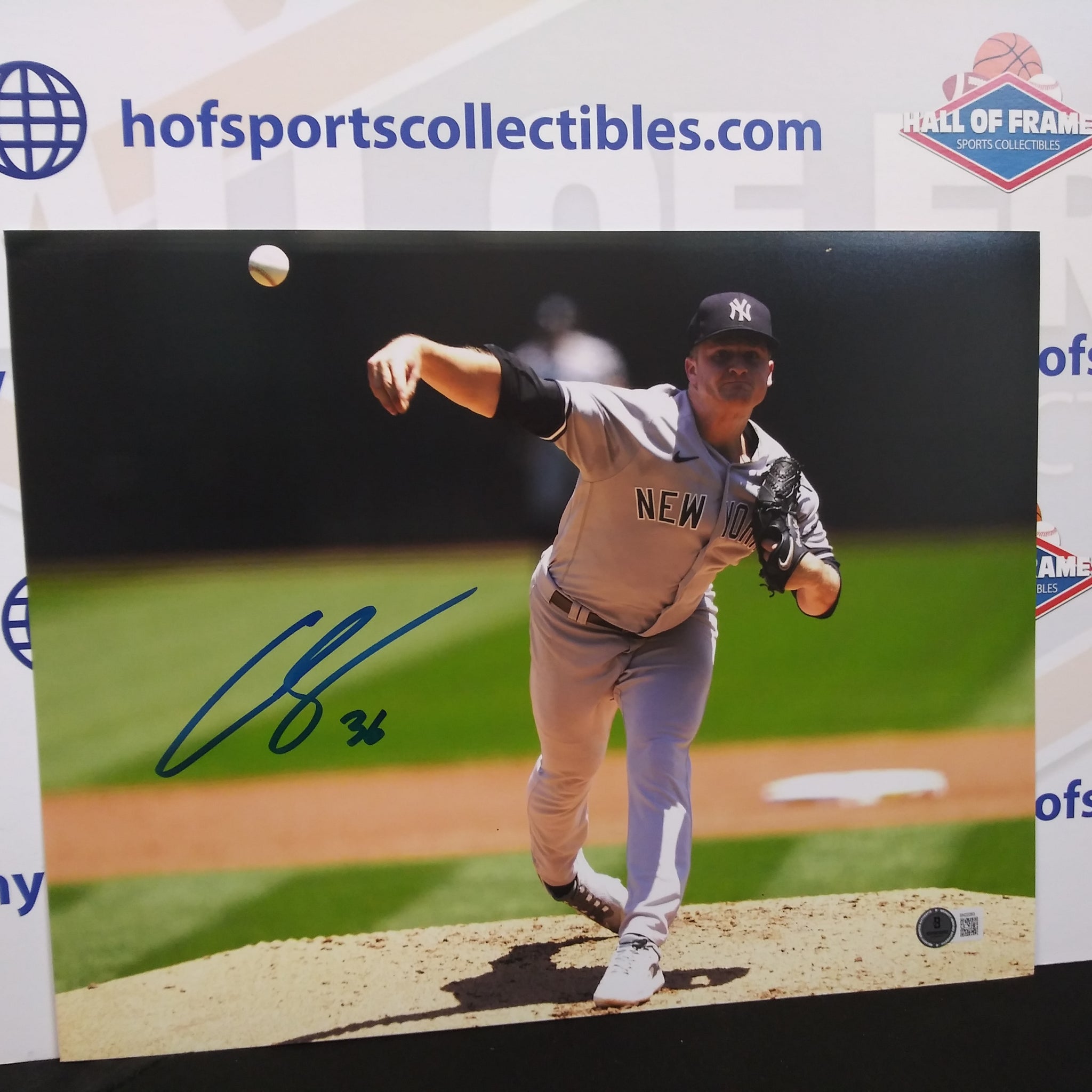 CLARKE SCHMIDT SIGNED YANKEES 11X14 PHOTO - BECKETT COA