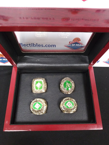 OAKLAND ATHLETICS 4 CHAMPIONSHIP RING SET WITH BOX!