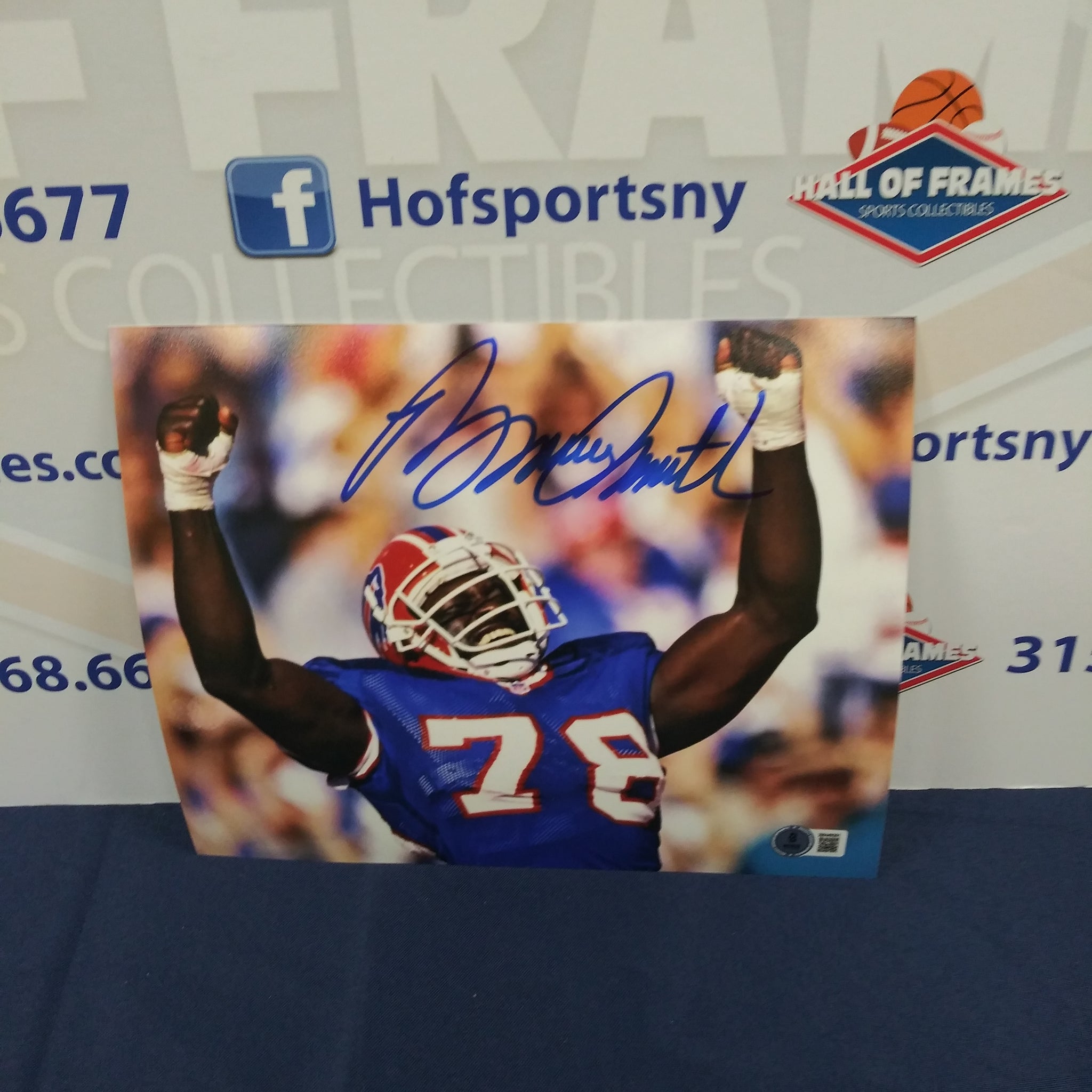 BRUCE SMITH SIGNED BUFFALO BILLS CELEBRATION 8X10  BECKETT COA