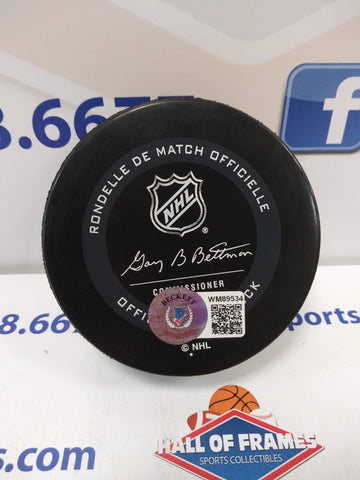 ANDERS LEE NEW YORK ISLANDERS SIGNED OFFICIAL GAME PUCK ORANGE INK BECKETT