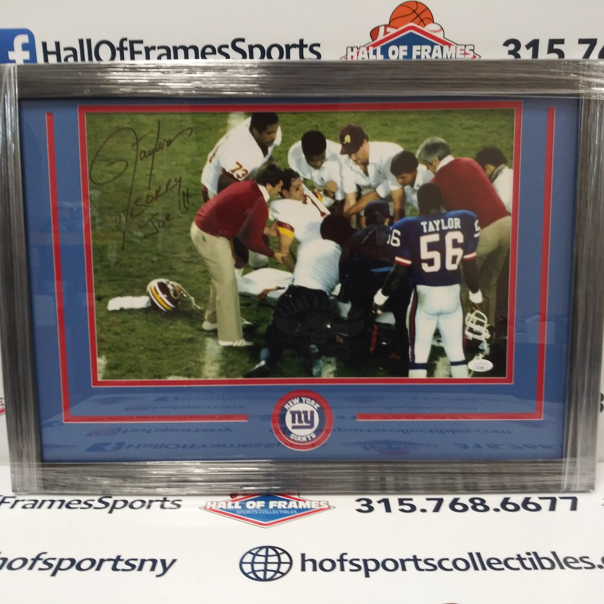 LAWRENCE TAYLOR SIGNED FRAMED 11X17 W/ THEISMANN INSC "SORRY JOE" - JSA COA
