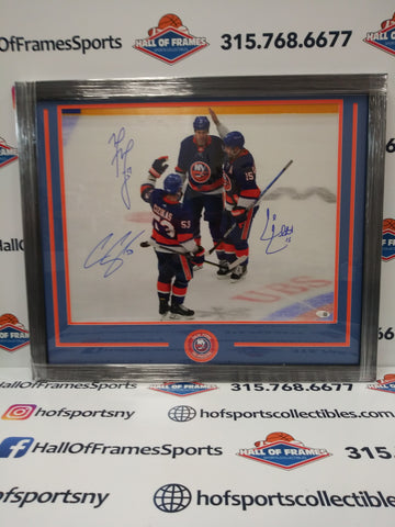 CASEY CIZIKAS MATT MARTIN CAL CLUTTERBUCK ISLANDERS 