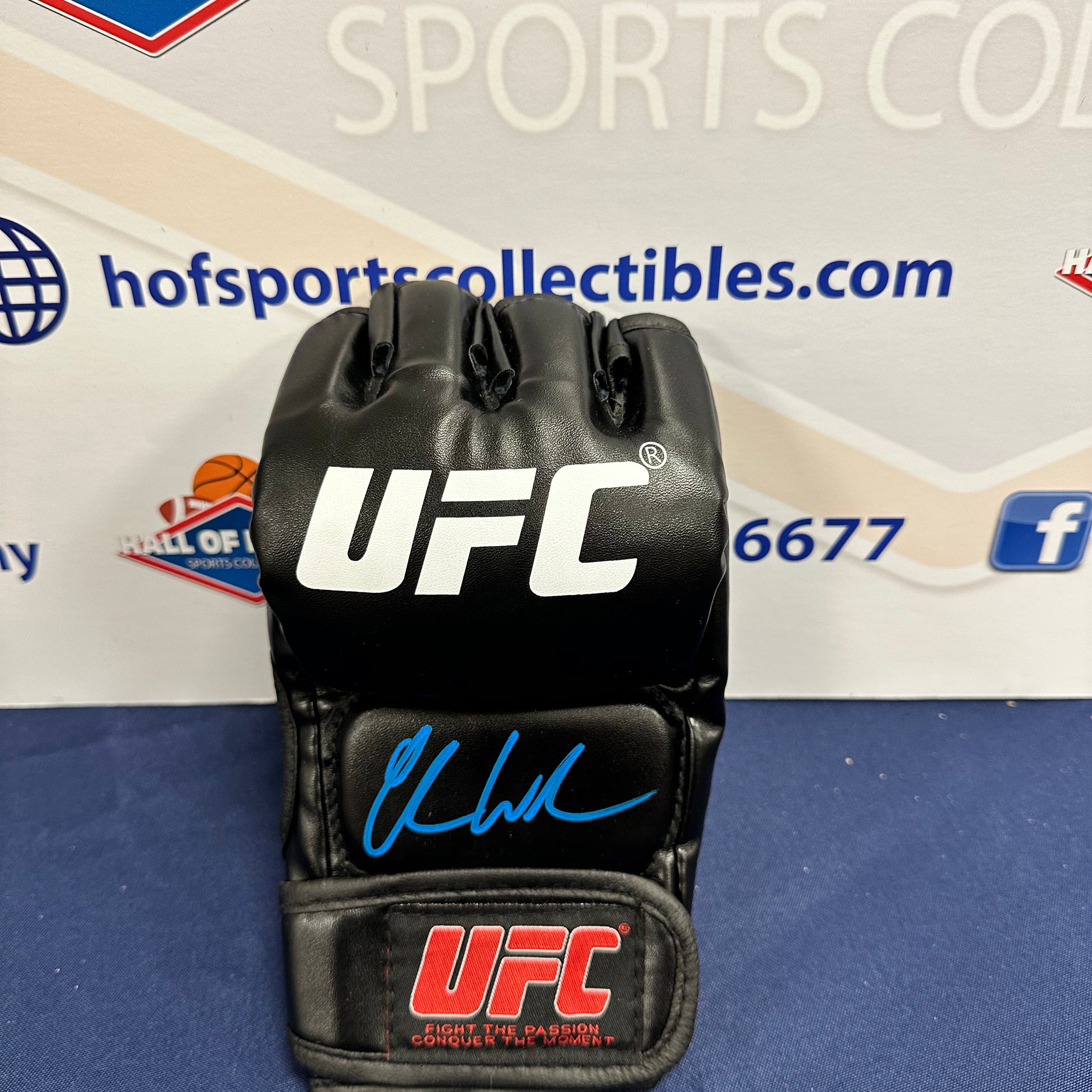 CHRIS WEIDMAN SIGNED UFC CHAMPION SIGNED GLOVE BAS COA