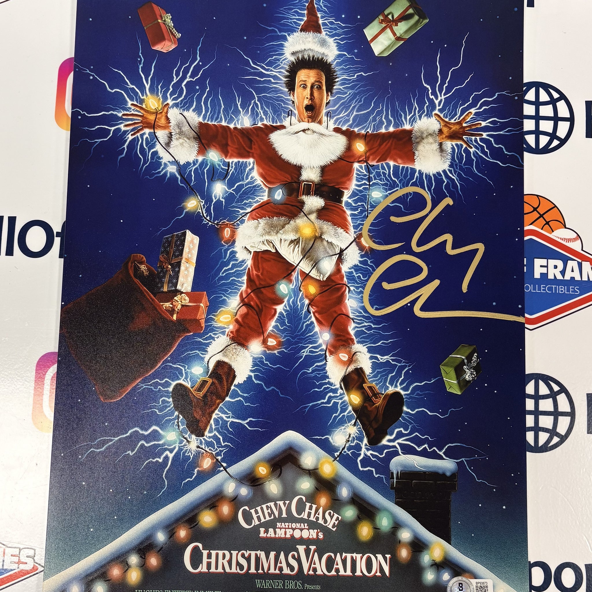 CHEVY CHASE SIGNED 11X17 CHRISTMAS VACATION MOVIE POSTER - BECKETT COA
