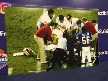 LAWRENCE TAYLOR SIGNED 11X17 W/ THEISMANN INSC "SORRY JOE" - JSA COA